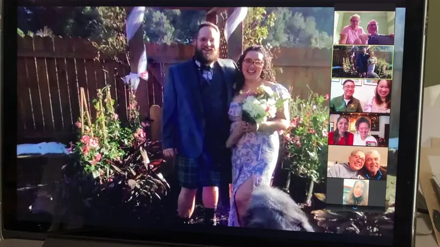 Laura and Bryce celebrating their marriage in their Mt. Baldy backyard.
