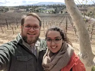 Laura and Bryce together at a vineyard.