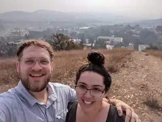 Laura and Bryce hiking above Cal Poly Pomona, their college.