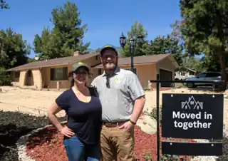 Laura and Bryce outside their Upland home, with the house and trees preserved and the sky removed.