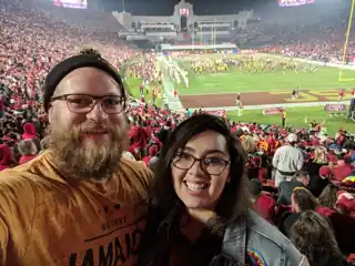Laura and Bryce watching football at the Los Angeles Coliseum.