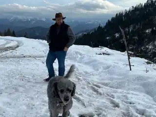 Bryce and Weir on a snowy mountain trail.